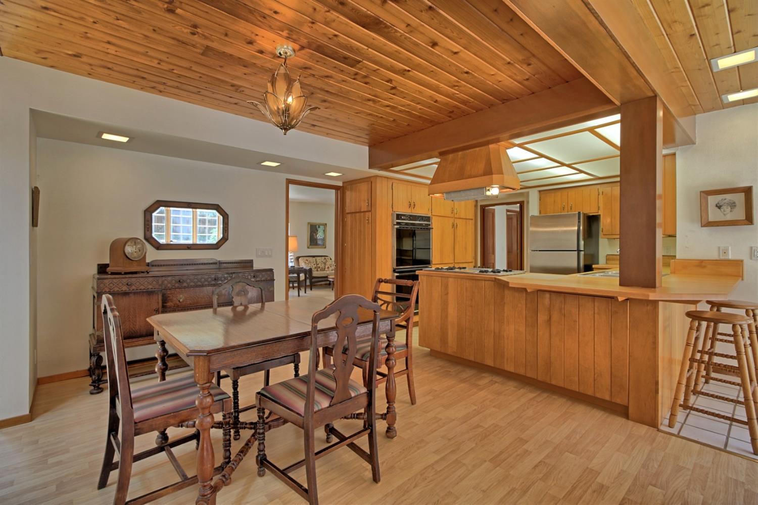 205 Palomar Road Ojai, CA 93023 - Photo 14 of 38 a view of a dining room with furniture and wooden floor