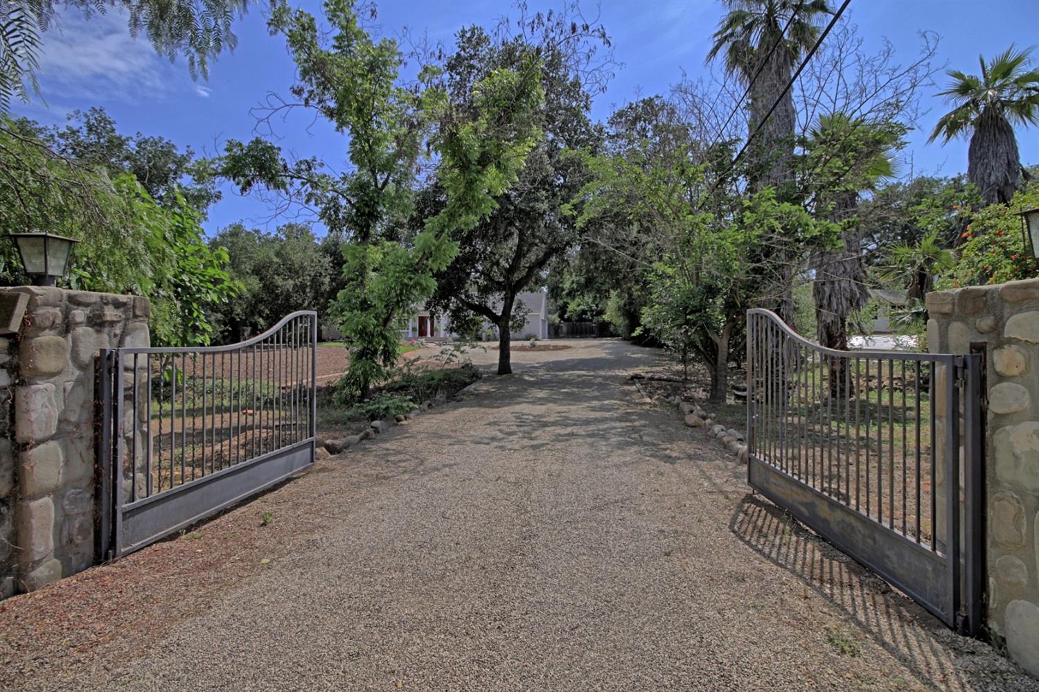205 Palomar Road Ojai, CA 93023 - Photo 2 of 38 a view of street along with trees