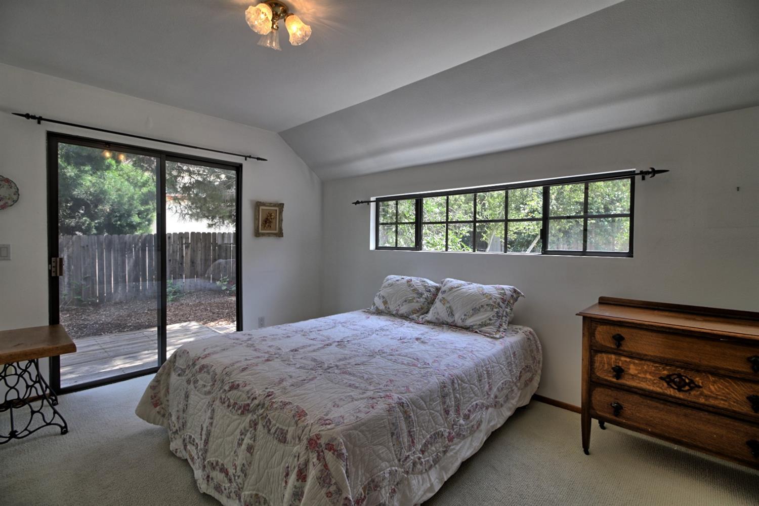 205 Palomar Road Ojai, CA 93023 - Photo 25 of 38 a bedroom with a bed and a night stand
