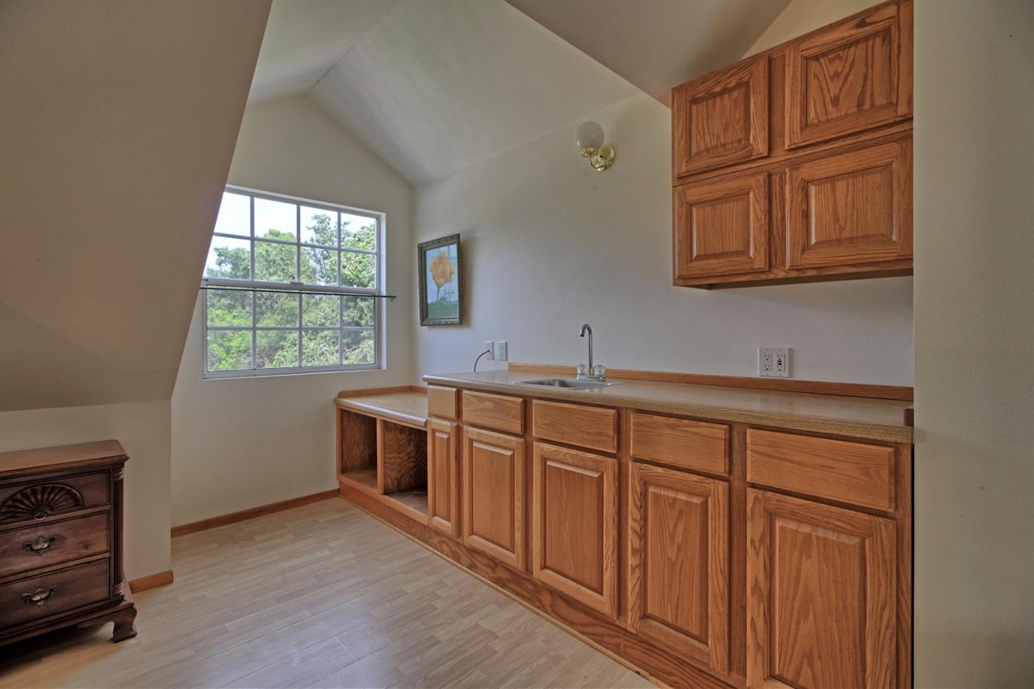 205 Palomar Road Ojai, CA 93023 - Photo 30 of 38 a kitchen with stainless steel appliances granite countertop a dishwasher a stove a sink and dishwasher with wooden floor