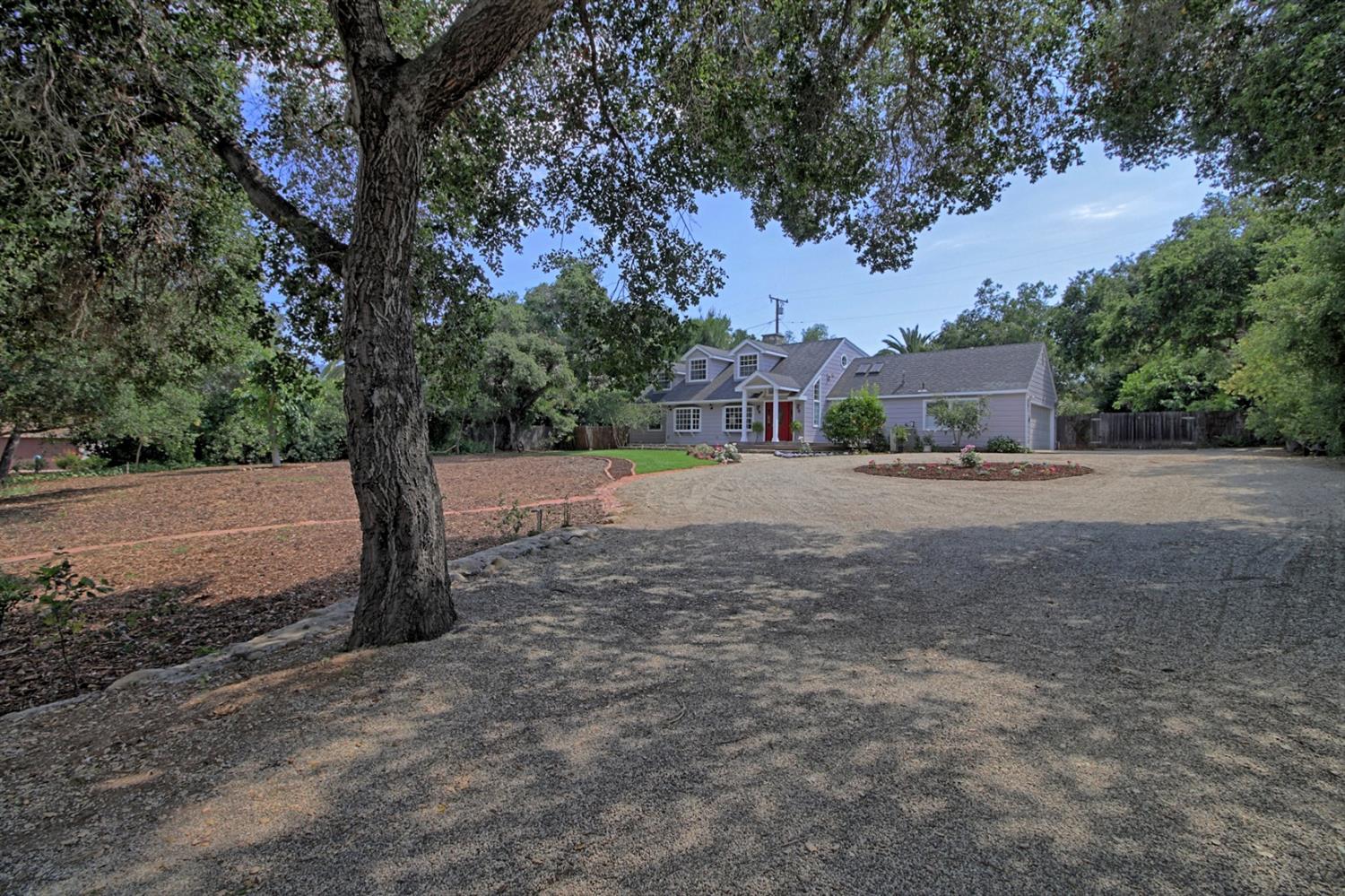 205 Palomar Road Ojai, CA 93023 - Photo 3 of 38 a view of a street with a tree