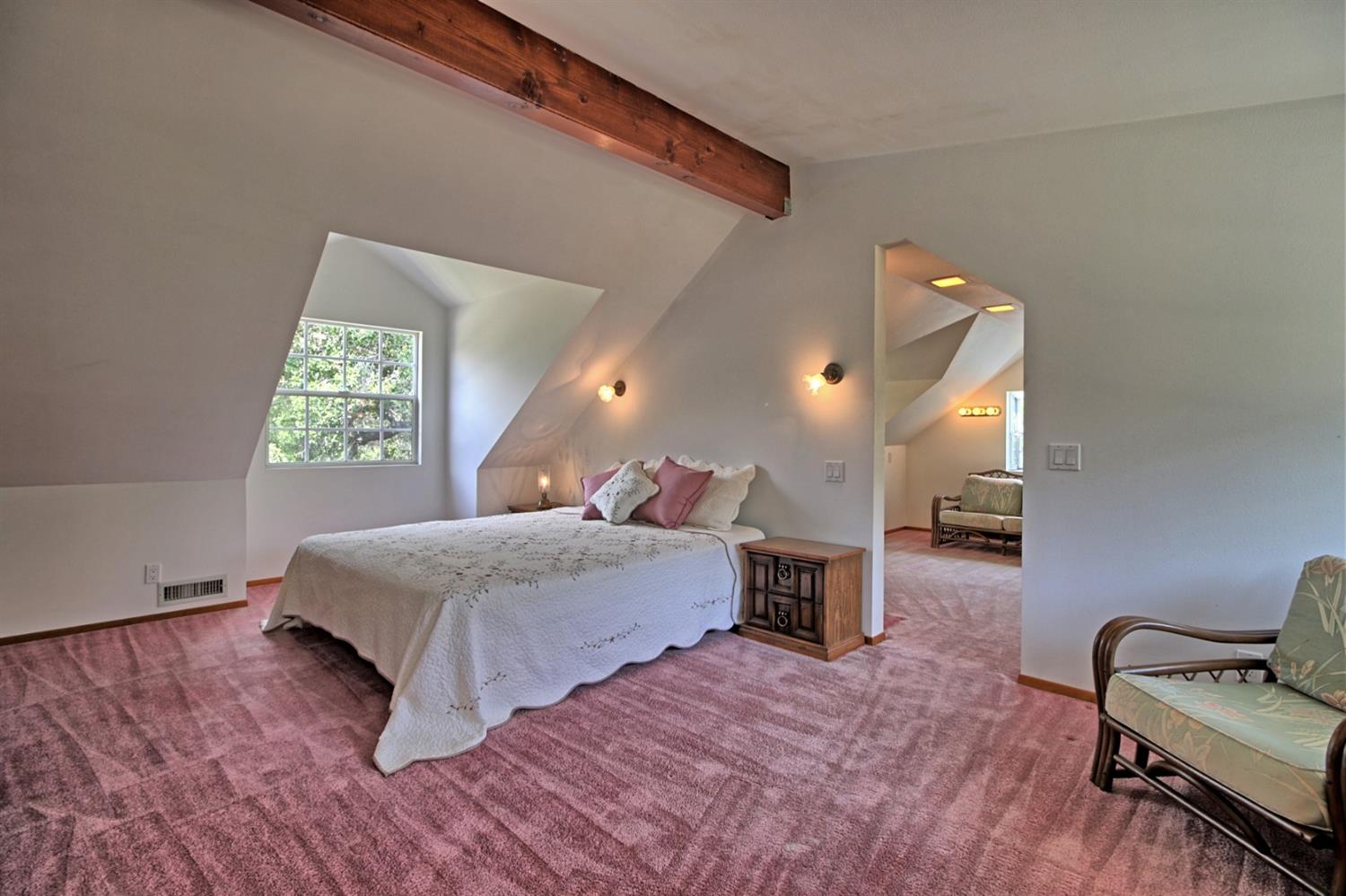 205 Palomar Road Ojai, CA 93023 - Photo 32 of 38 a spacious bedroom with a bed and window