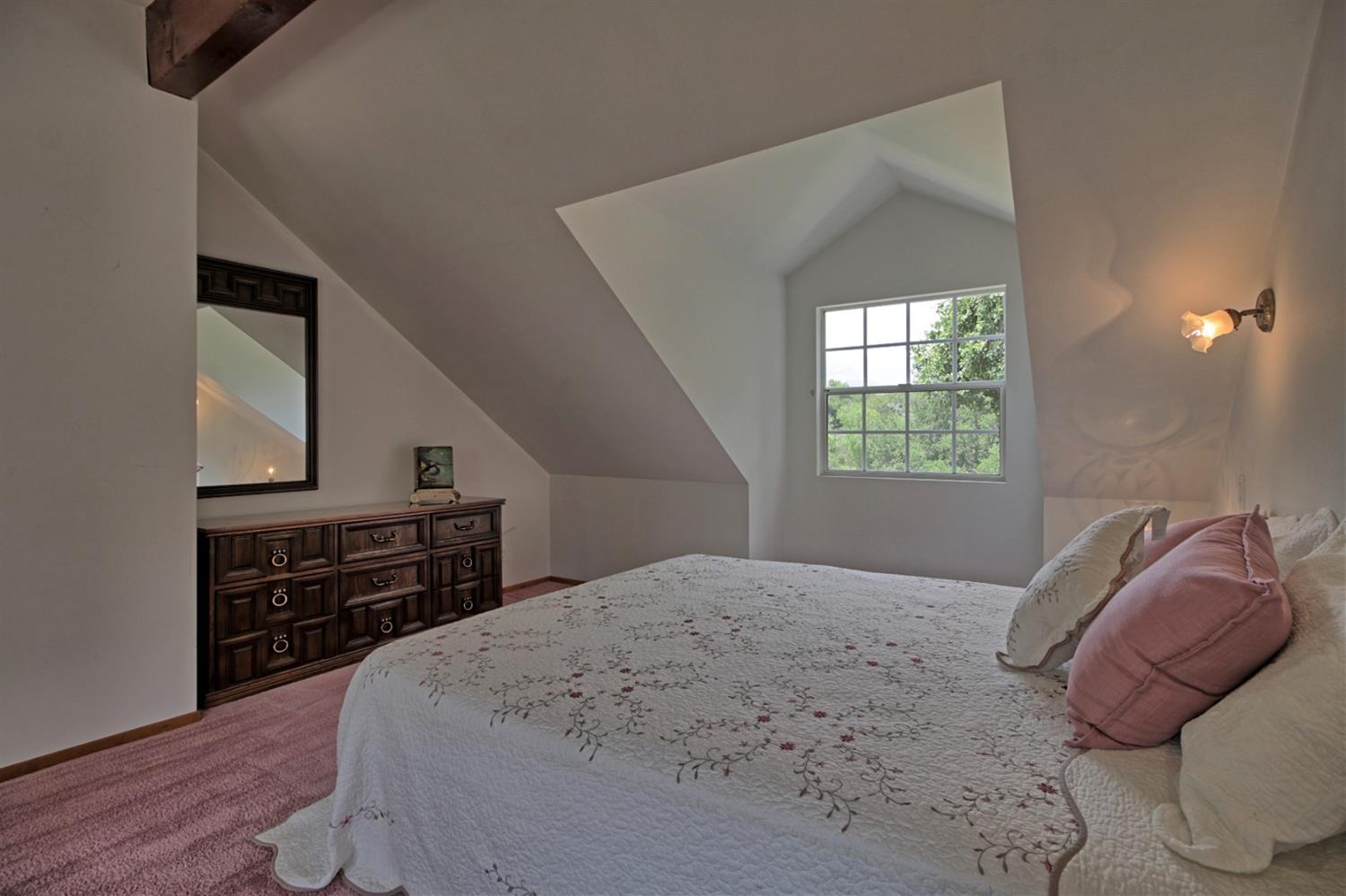 205 Palomar Road Ojai, CA 93023 - Photo 34 of 38 a bedroom with a bed and a dresser