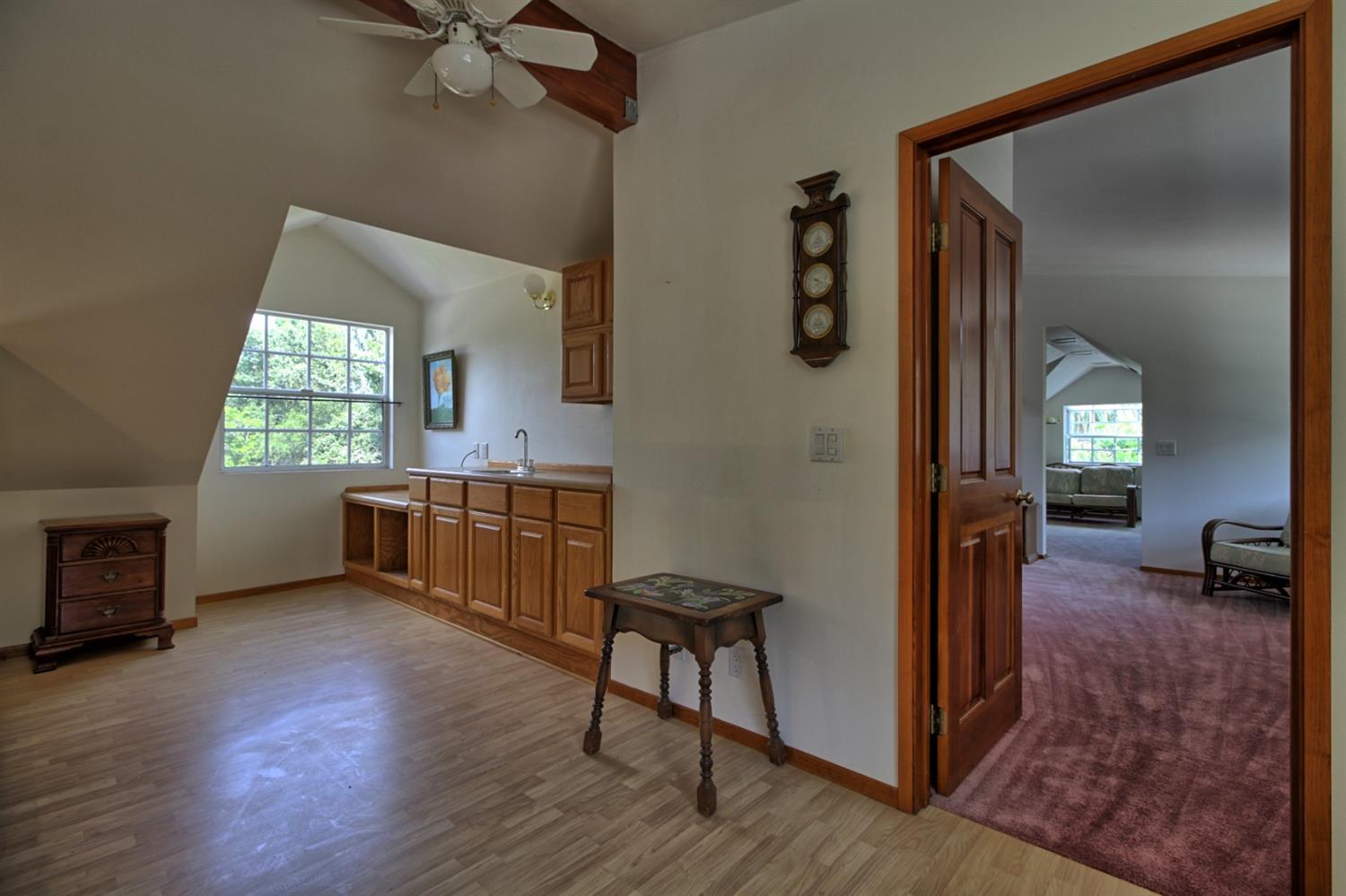 205 Palomar Road Ojai, CA 93023 - Photo 36 of 38 a view of a livingroom with furniture and a window