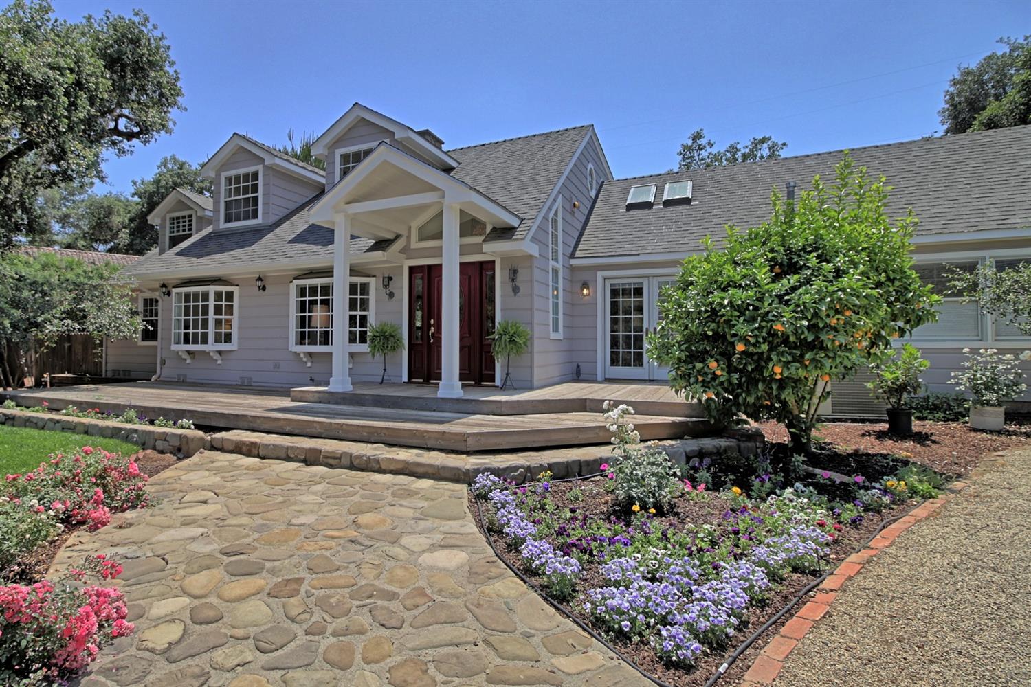 205 Palomar Road Ojai, CA 93023 - Photo 6 of 38 a front view of a house with garden