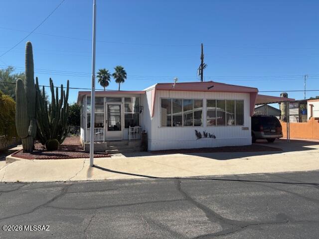 5731 West Flying M Street Tucson, AZ 85713 - Photo 2 of 20 a view of a house with a patio
