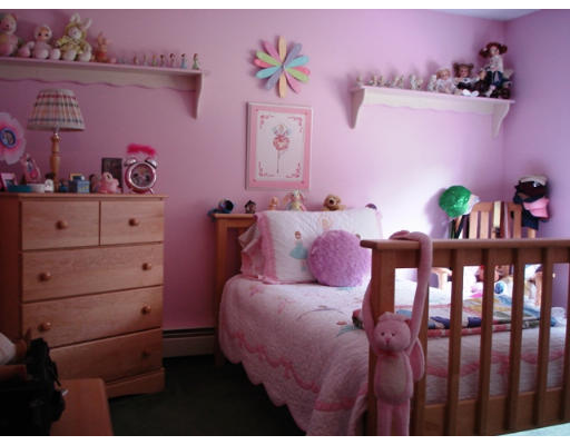 57 Holden Road Shirley, MA 01464 - Photo 11 of 18 a bedroom with a bed and with wooden floor