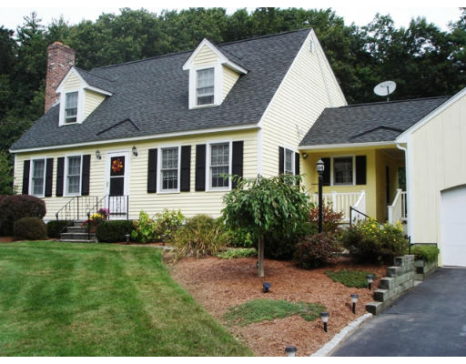 57 Holden Road Shirley, MA 01464 - Photo 2 of 18 a house that has a lot of plants in it