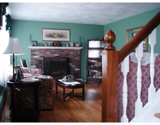 57 Holden Road Shirley, MA 01464 - Photo 8 of 18 a living room with furniture and a fireplace