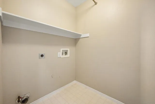 a view of a house with backyard and porch