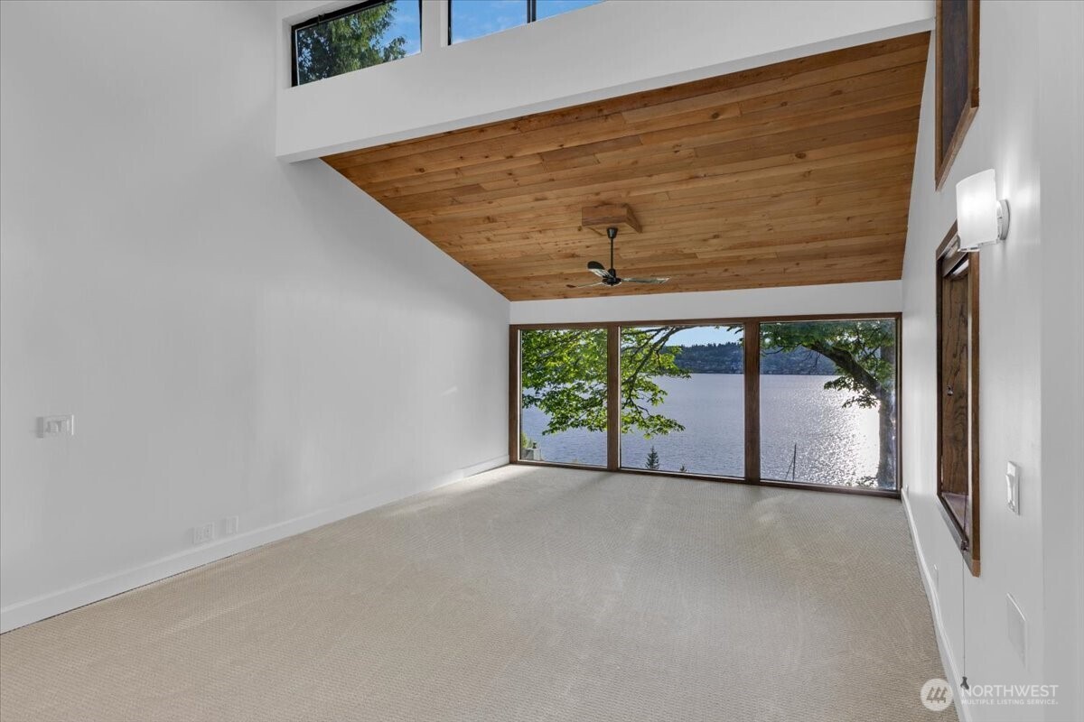 16015 Inglewood Road Northeast Kenmore, WA 98028 - Photo 12 of 37 a view of a room with a large window