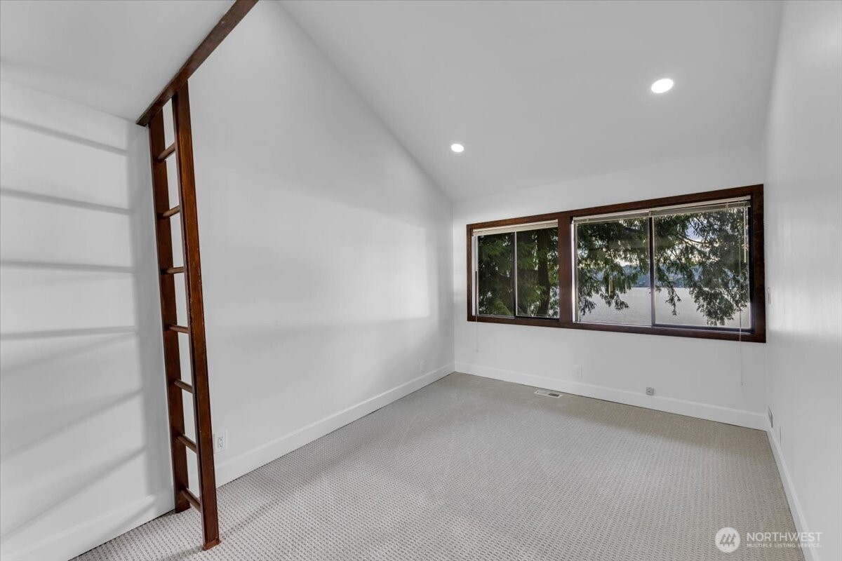 16015 Inglewood Road Northeast Kenmore, WA 98028 - Photo 21 of 37 a view of hallway with window