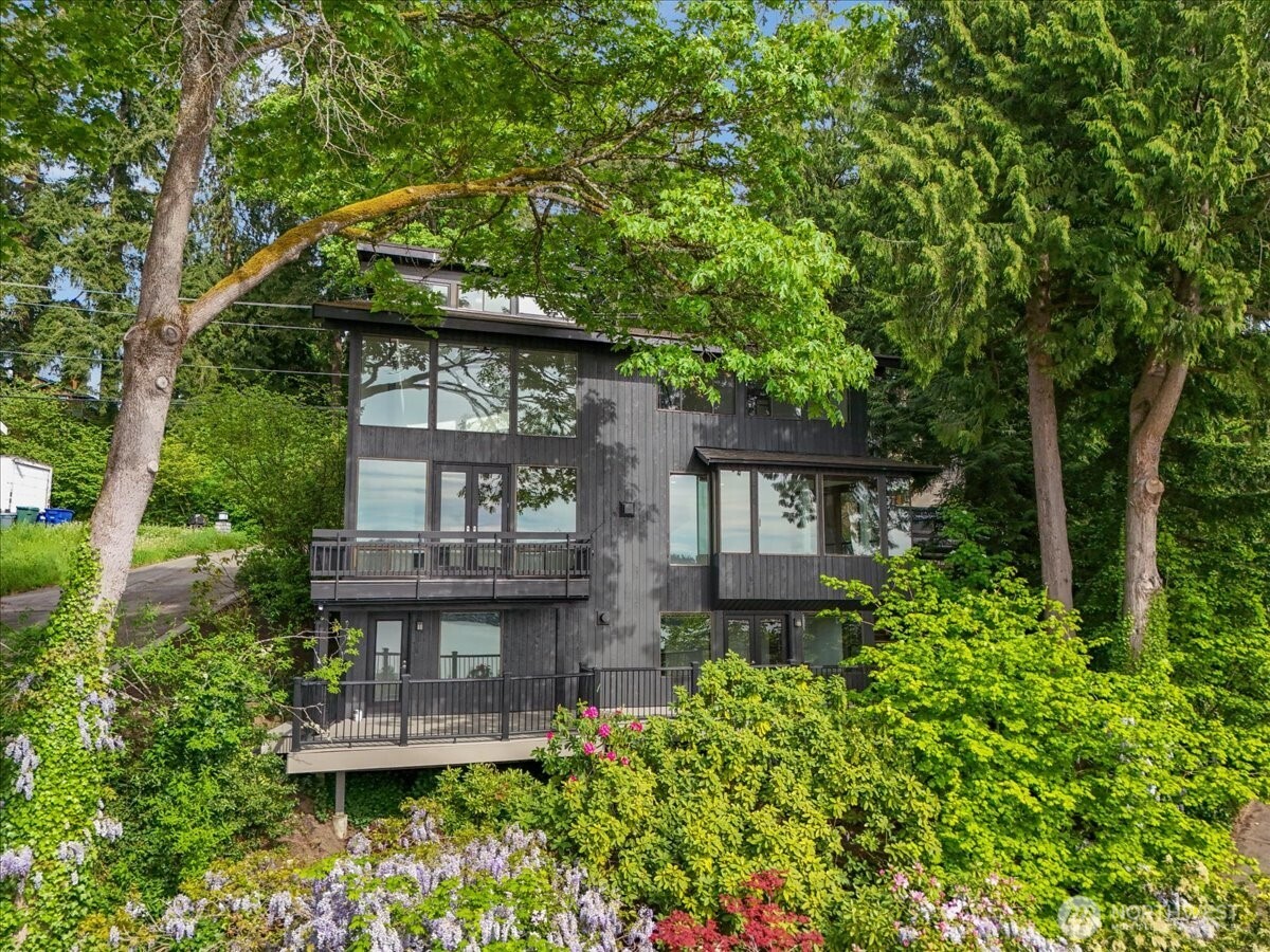 16015 Inglewood Road Northeast Kenmore, WA 98028 - Photo 7 of 37 front view of a house with a small yard