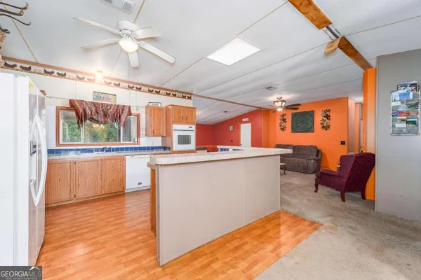 a view of a living room and dining room