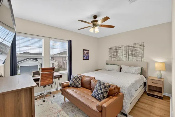 a bathroom with a shower and a sink