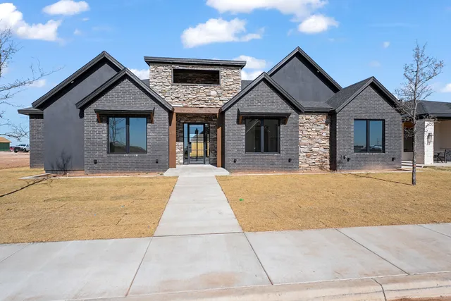 a front view of house with yard