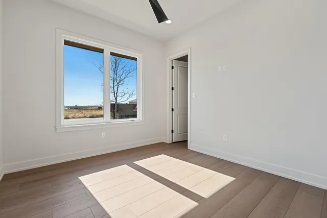 a view of an empty room with cabinet