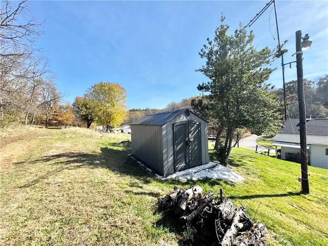 a view of a garden with an empty space