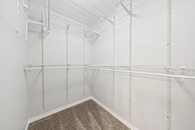 a view of a hallway with staircase