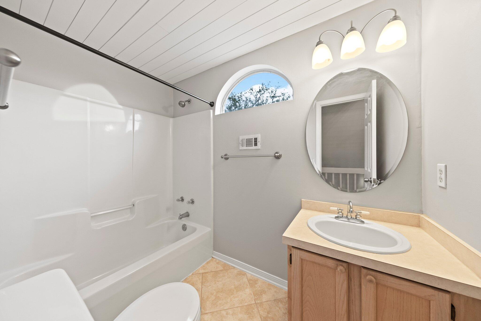 3621 Goldsbys Way Destin, FL 32541 - Photo 30 of 43 a bathroom with a sink and a mirror