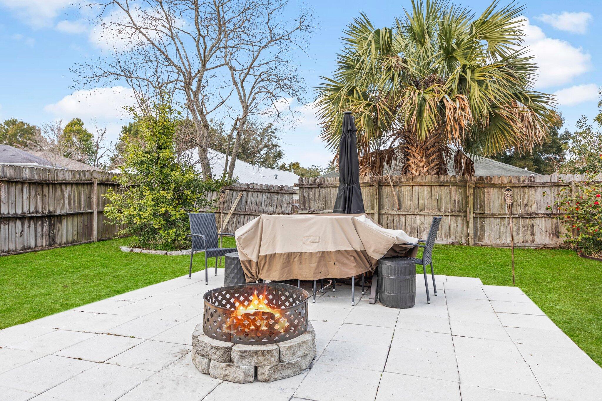 3621 Goldsbys Way Destin, FL 32541 - Photo 40 of 43 a view of a backyard with a garden and trees