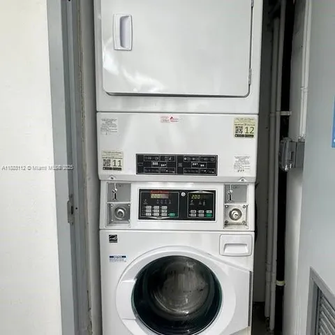 a view of washer and dryer in a utility room