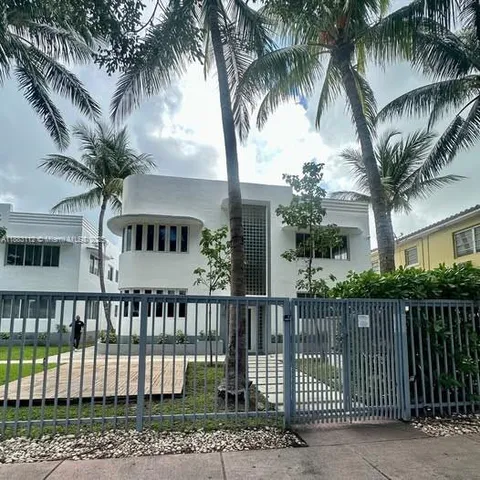 a view of a house with a garden
