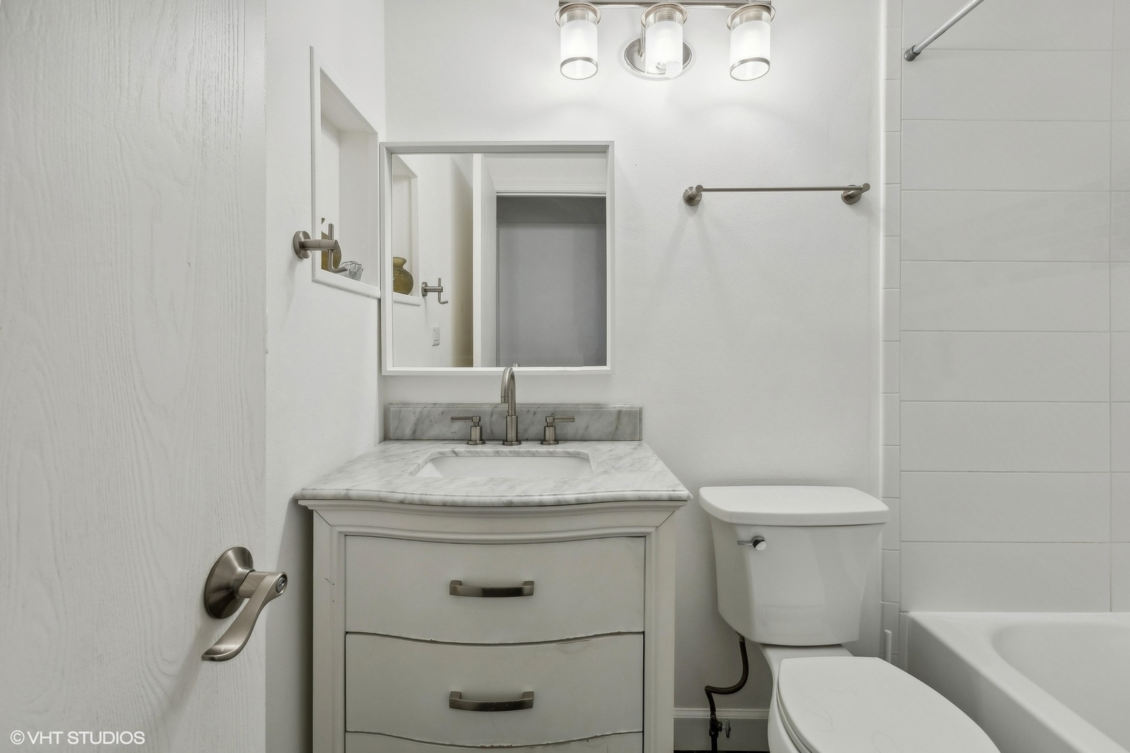 3243 Gresham Lane East Aurora, IL 60504 - Photo 12 of 28 a bathroom with a granite countertop toilet sink and mirror