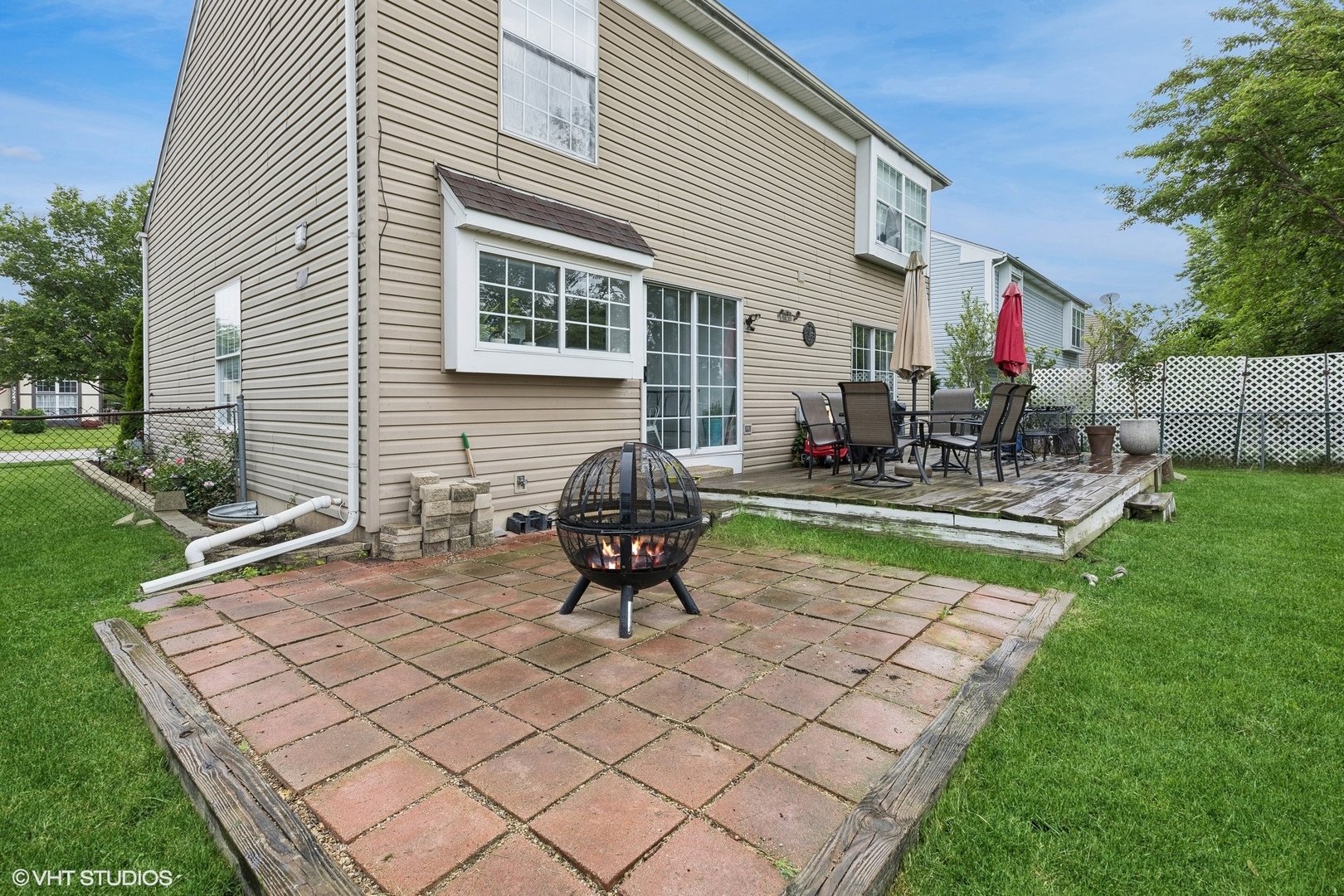 3243 Gresham Lane East Aurora, IL 60504 - Photo 23 of 28 a view of a backyard with sitting area