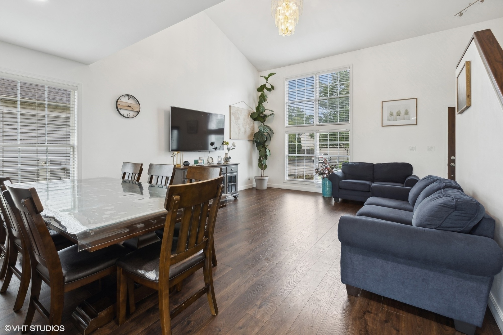 3243 Gresham Lane East Aurora, IL 60504 - Photo 5 of 28 a living room with furniture a flat screen tv and wooden floor