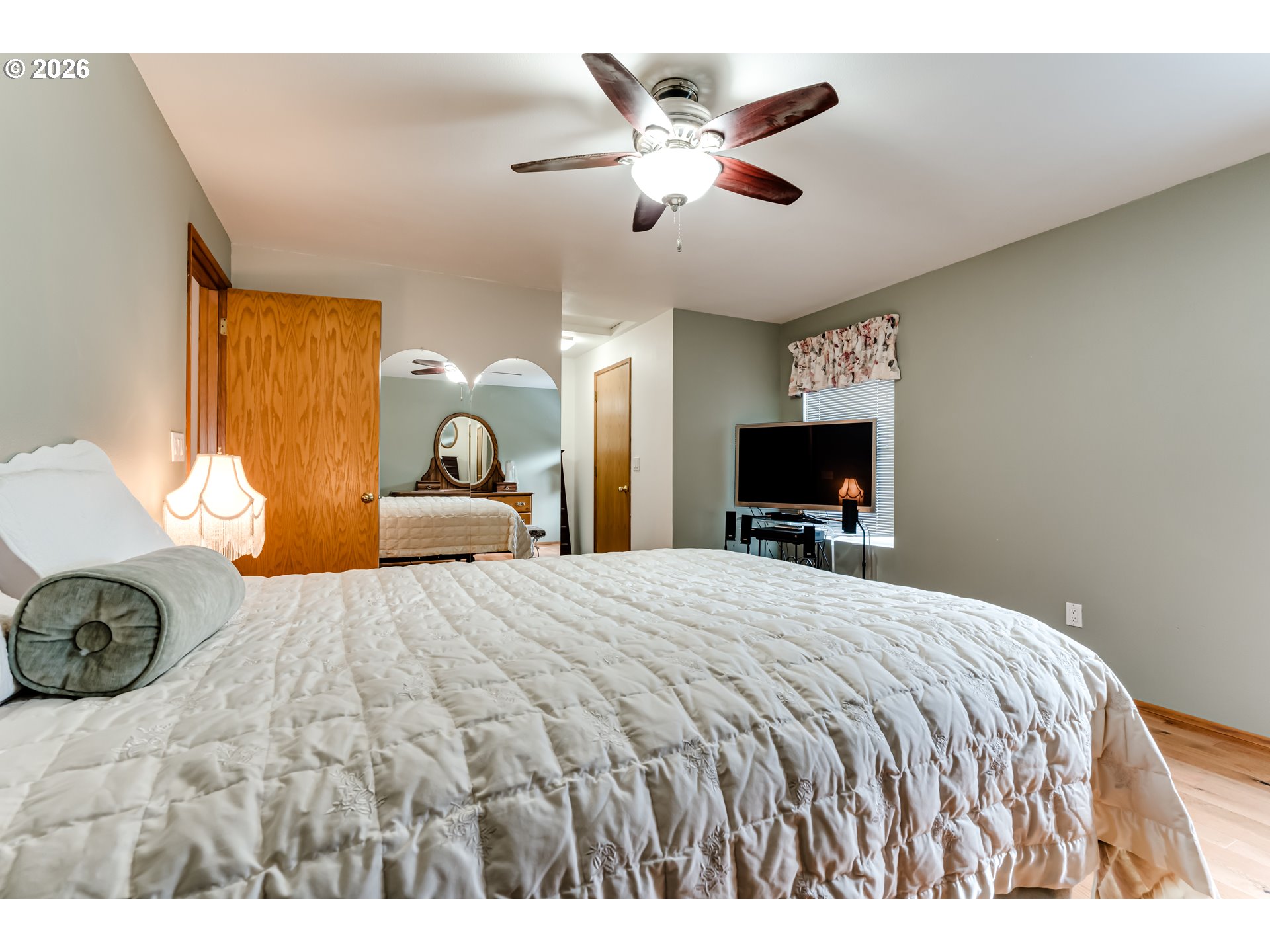 5131 Trevon Street Eugene, OR 97402 - Photo 22 of 42 a bedroom with a bed and a flat screen tv