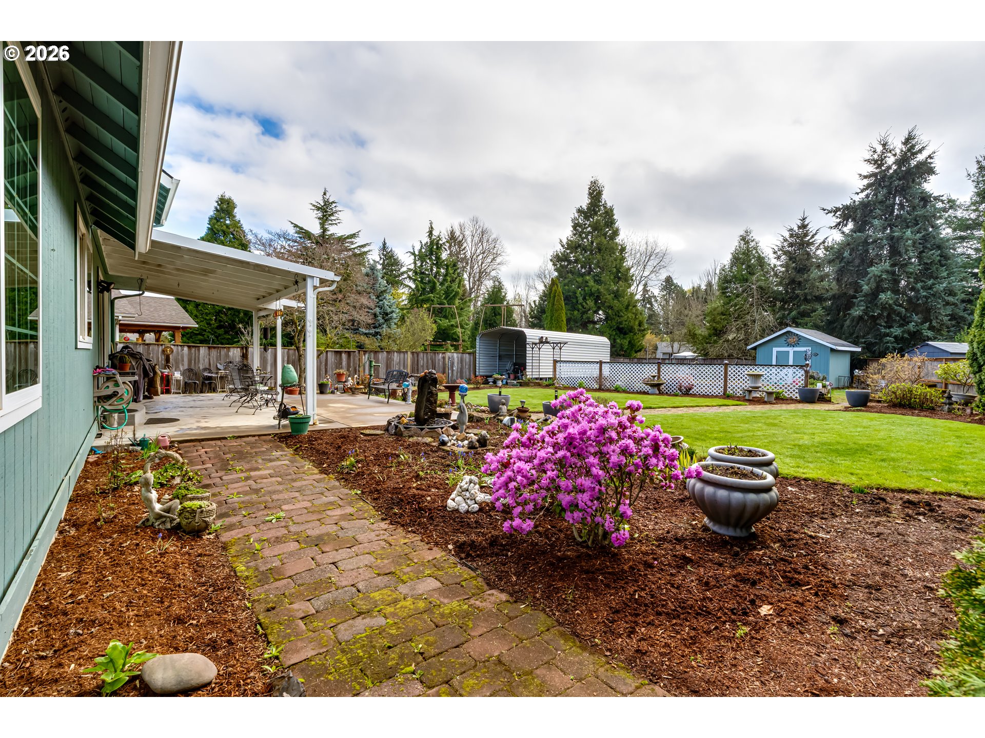 5131 Trevon Street Eugene, OR 97402 - Photo 28 of 42 a view of a backyard with sitting area
