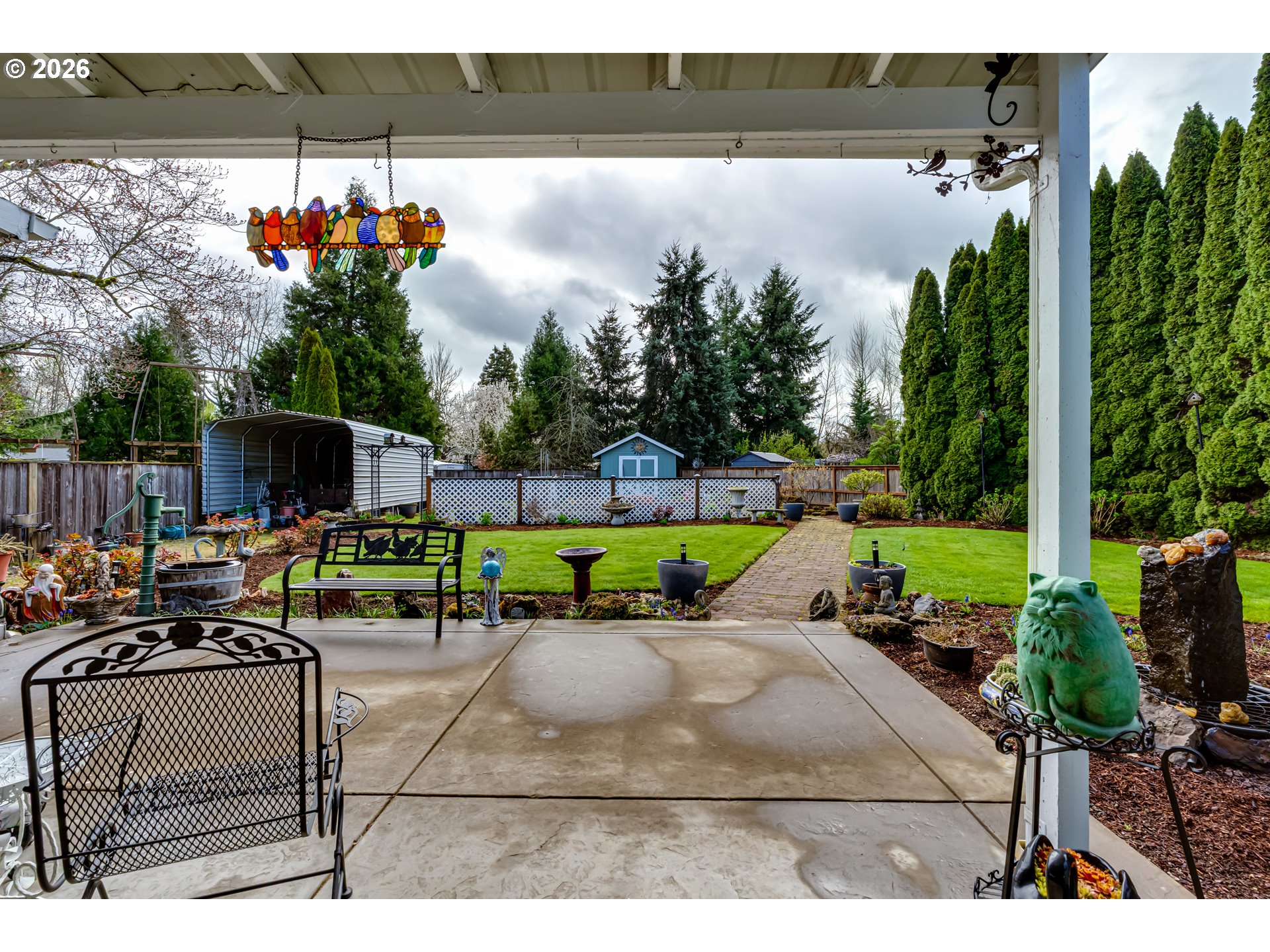 5131 Trevon Street Eugene, OR 97402 - Photo 36 of 42 a view of a chairs and table in the back yard