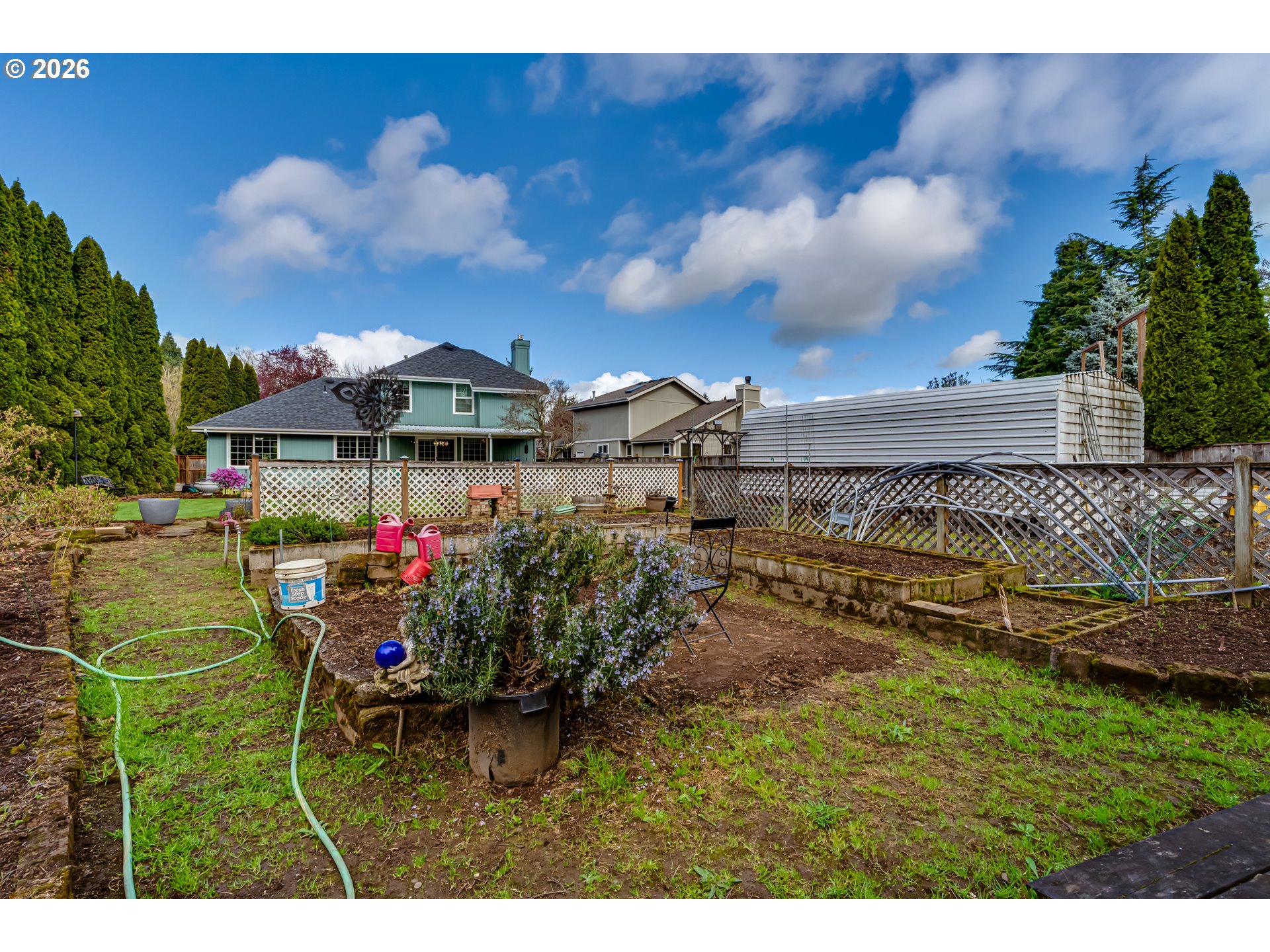 5131 Trevon Street Eugene, OR 97402 - Photo 38 of 42 a aerial view of a house with a big yard and large trees