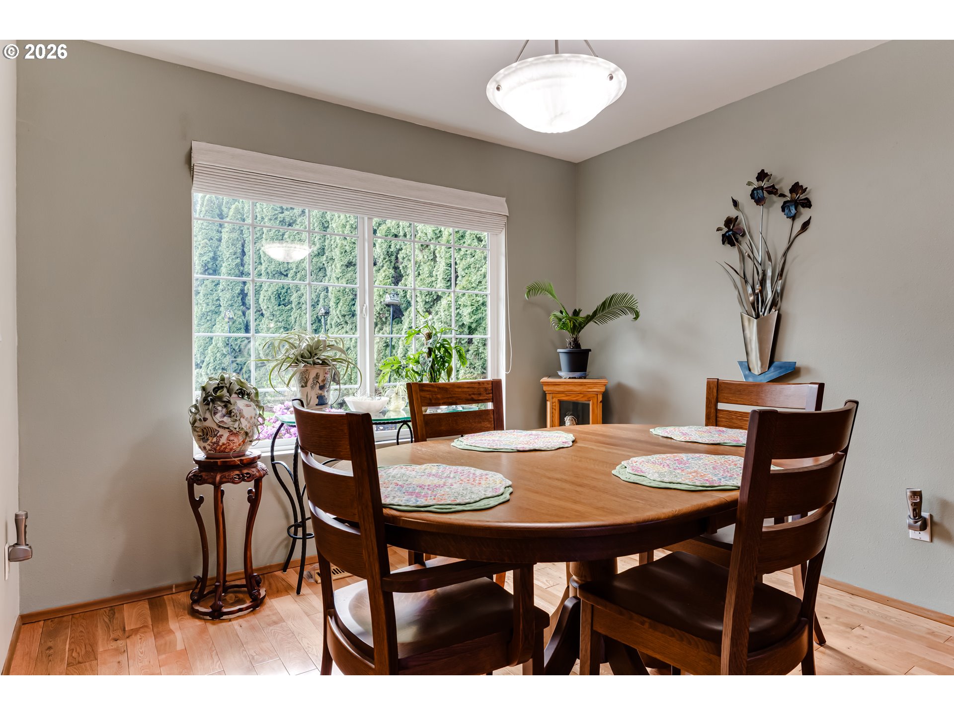 5131 Trevon Street Eugene, OR 97402 - Photo 9 of 42 a view of a dining room with furniture and wooden floor