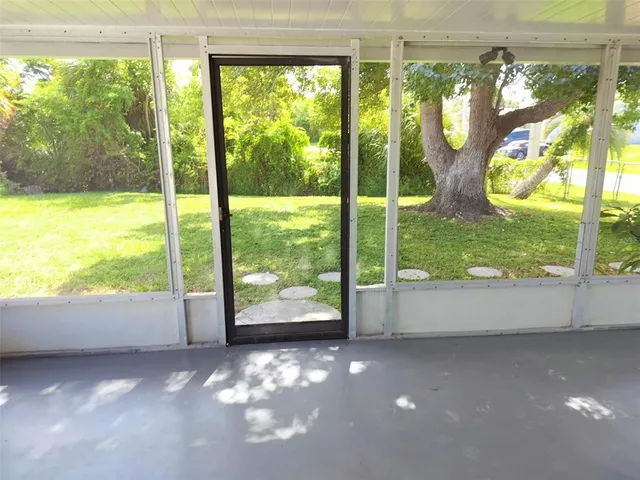 a view of an empty room and window