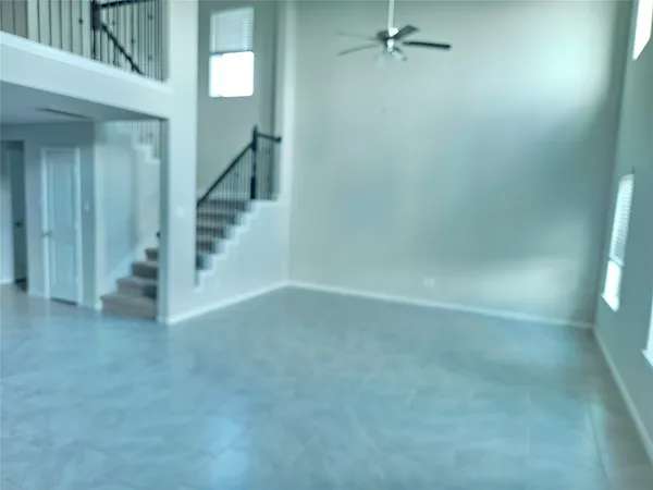 a view of a hallway with staircase