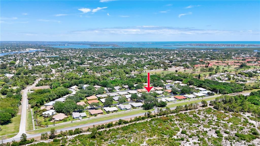 5139 Southeast Hanson Circle Stuart, FL 34997 - Photo 25 of 27 an aerial view of a city