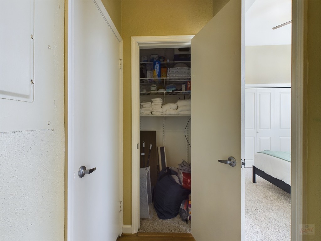 2811 Rio Grande Street, Unit 204 Austin, TX 78705 - Photo 29 of 31 a view of a bedroom from a hallway