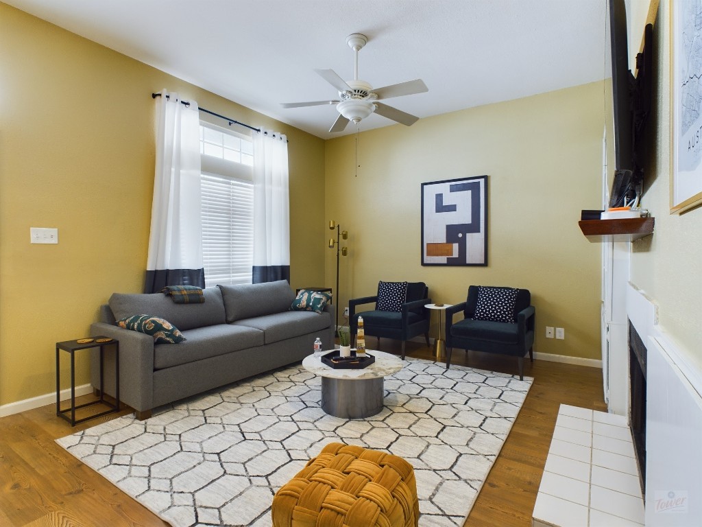 2811 Rio Grande Street, Unit 204 Austin, TX 78705 - Photo 3 of 31 a living room with furniture and a potted plant