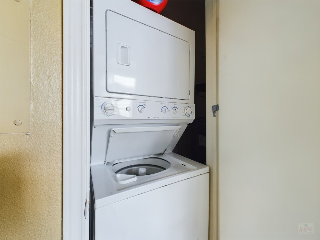 2811 Rio Grande Street, Unit 204 Austin, TX 78705 - Photo 31 of 31 a utility room with dryer and washer