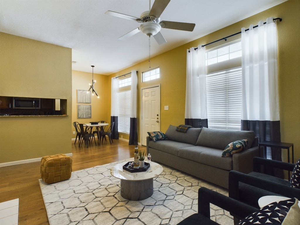 2811 Rio Grande Street, Unit 204 Austin, TX 78705 - Photo 4 of 31 a living room with furniture and a potted plant