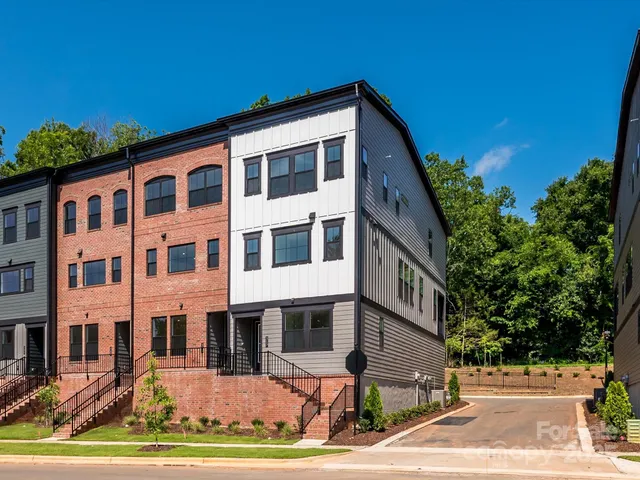 a front view of a building with street view