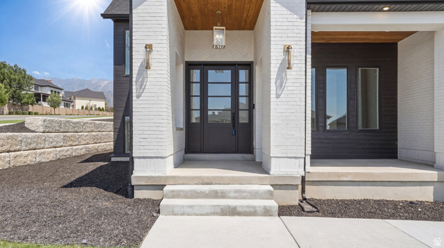 1682 North 1950 W Street, Unit 9 Provo, UT 84604 - Photo 9 of 84 Modern facade featuring white brick and dark horizontal siding