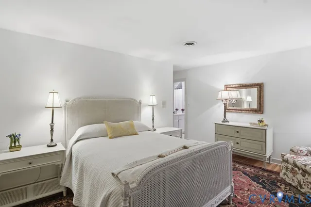 a bed room with a bed and a window