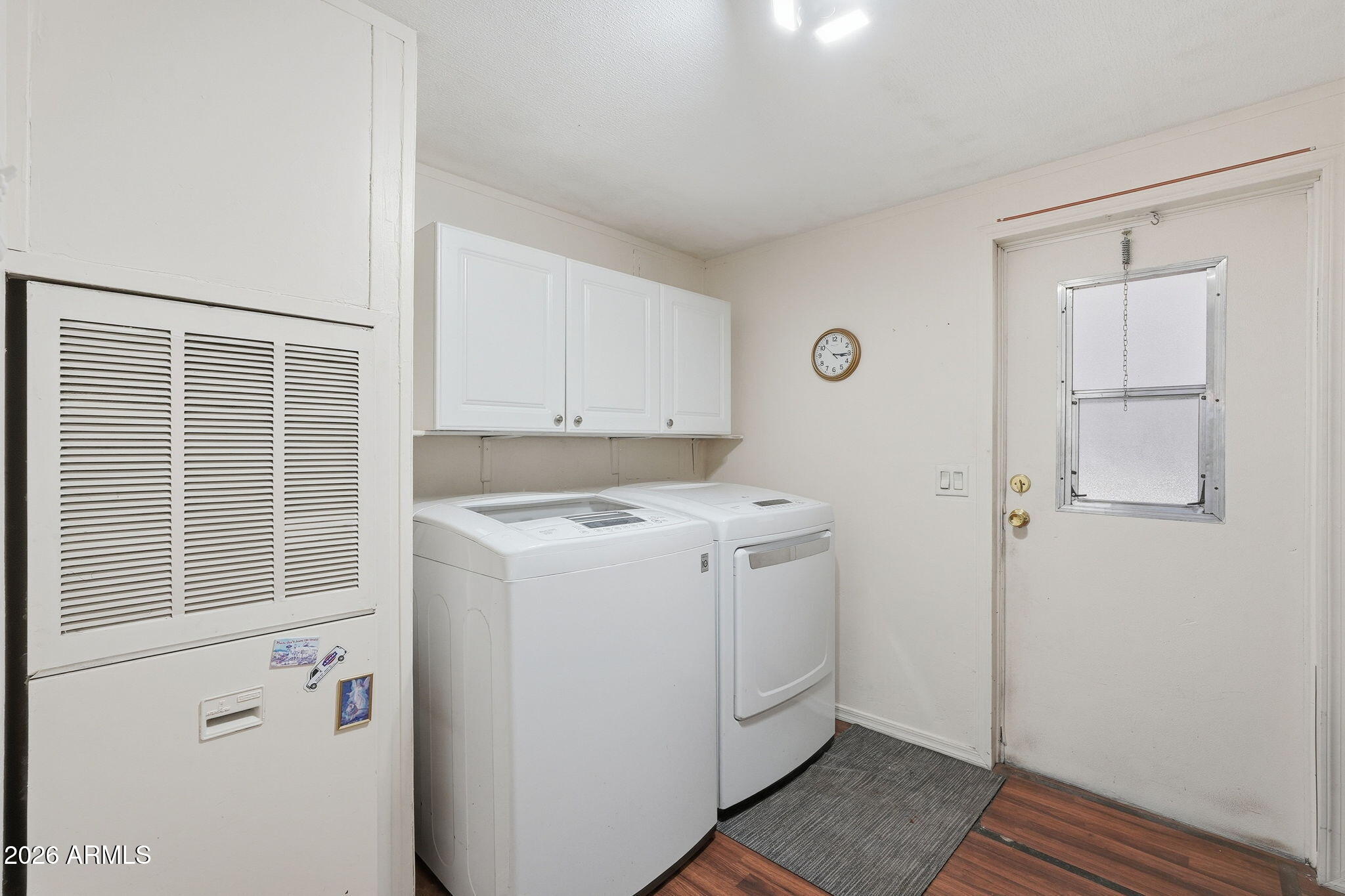 53 North Mountain Road, Unit 38 Apache Junction, AZ 85120 - Photo 27 of 35 a view of utility room with washer and dryer