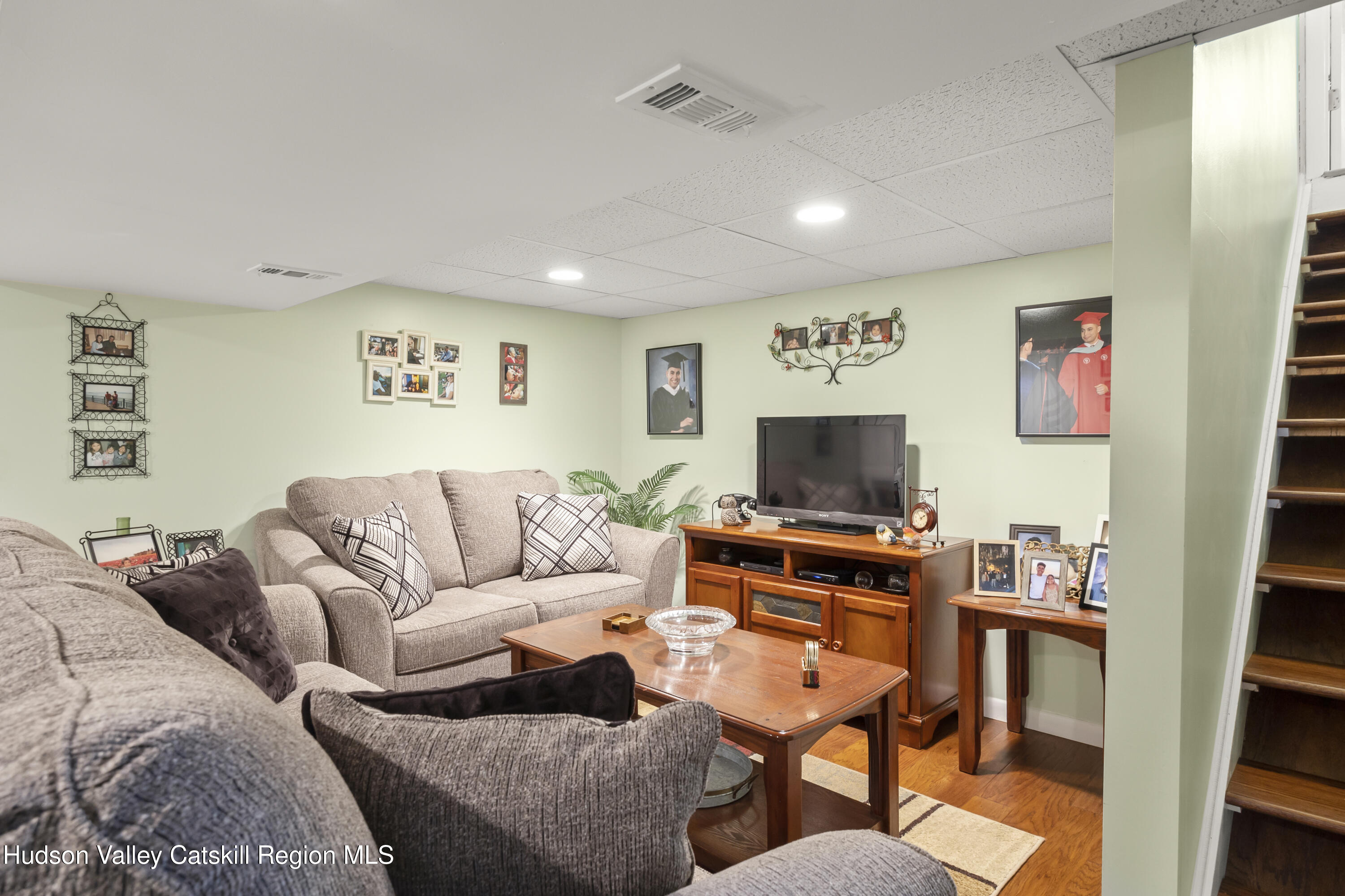 412 Vosenkill Road Athens, NY 12015 - Photo 15 of 43 a living room with furniture and a flat screen tv