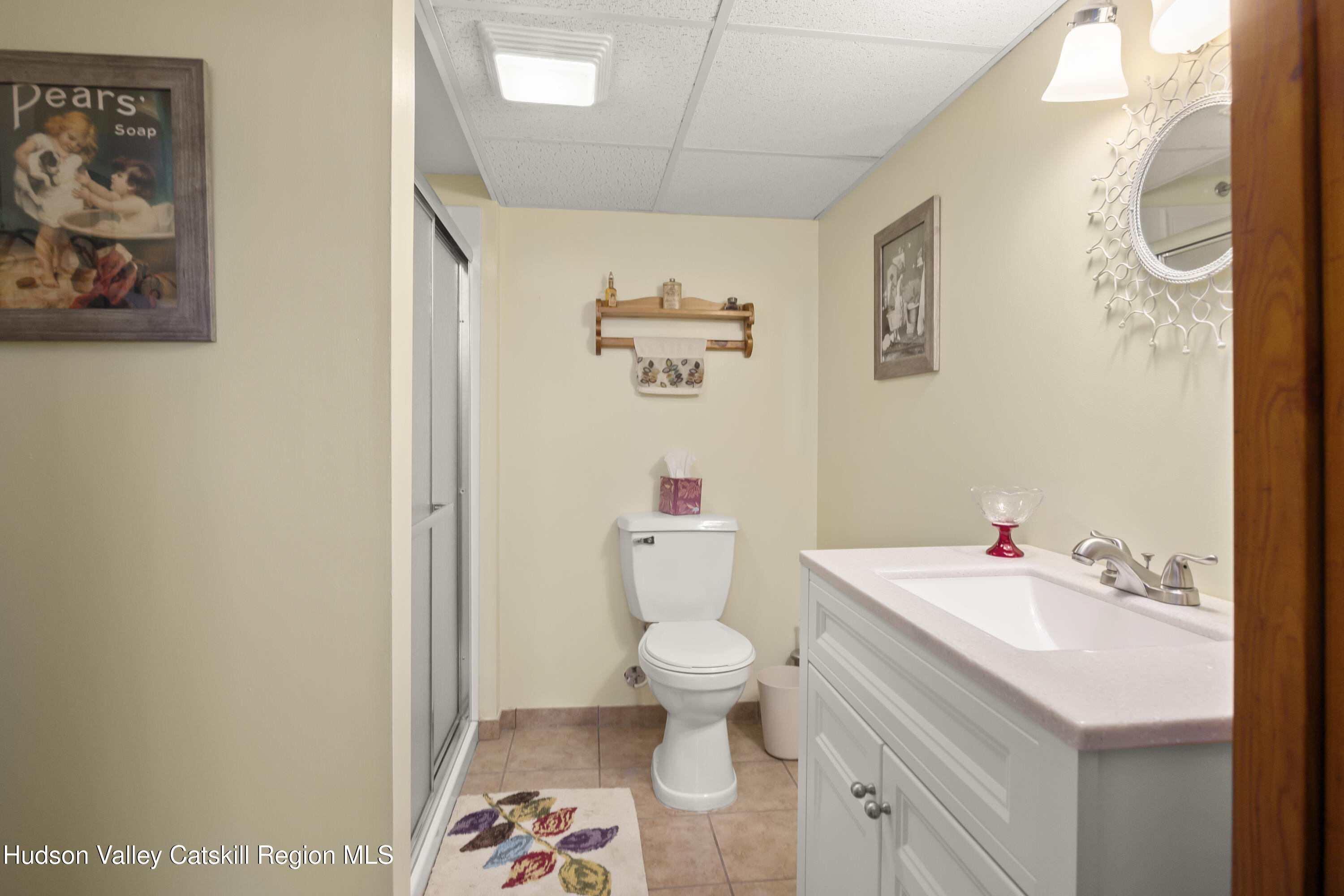 412 Vosenkill Road Athens, NY 12015 - Photo 18 of 43 a bathroom with a sink mirror and toilet