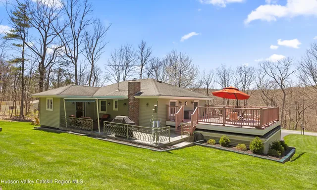 a view of a park with large trees