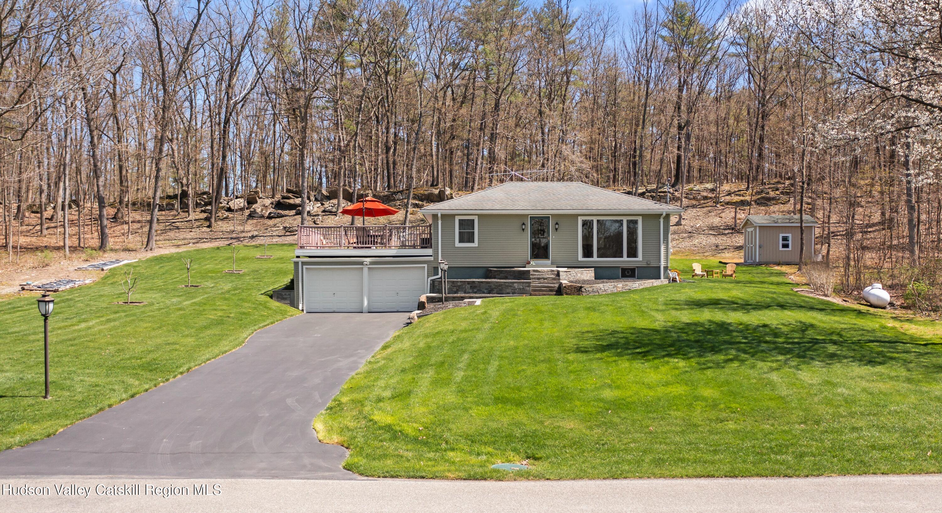 412 Vosenkill Road Athens, NY 12015 - Photo 32 of 43 a view of a house with a yard patio and swimming pool